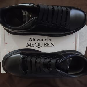 Alexander McQueen Black tennis shoe Shoe size says 12 but fits like 11 regular.